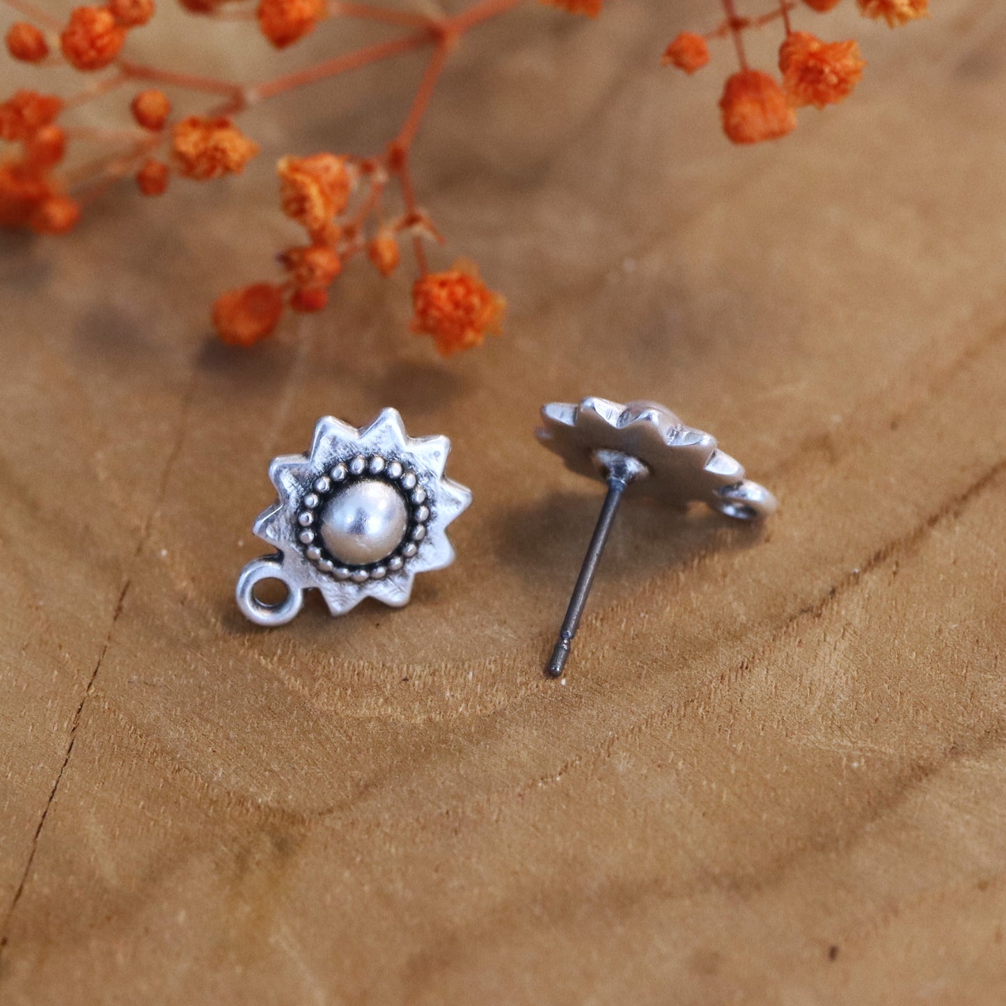 DQ silver sun stud with eye