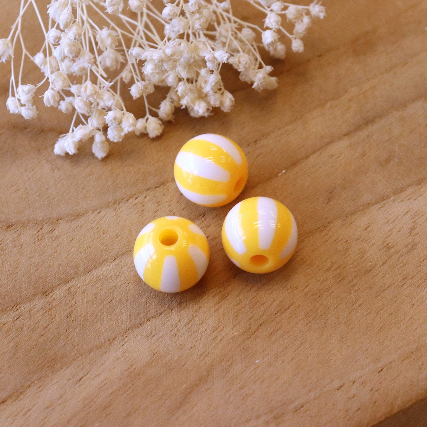 Gestreifte Acrylkugel - gelb