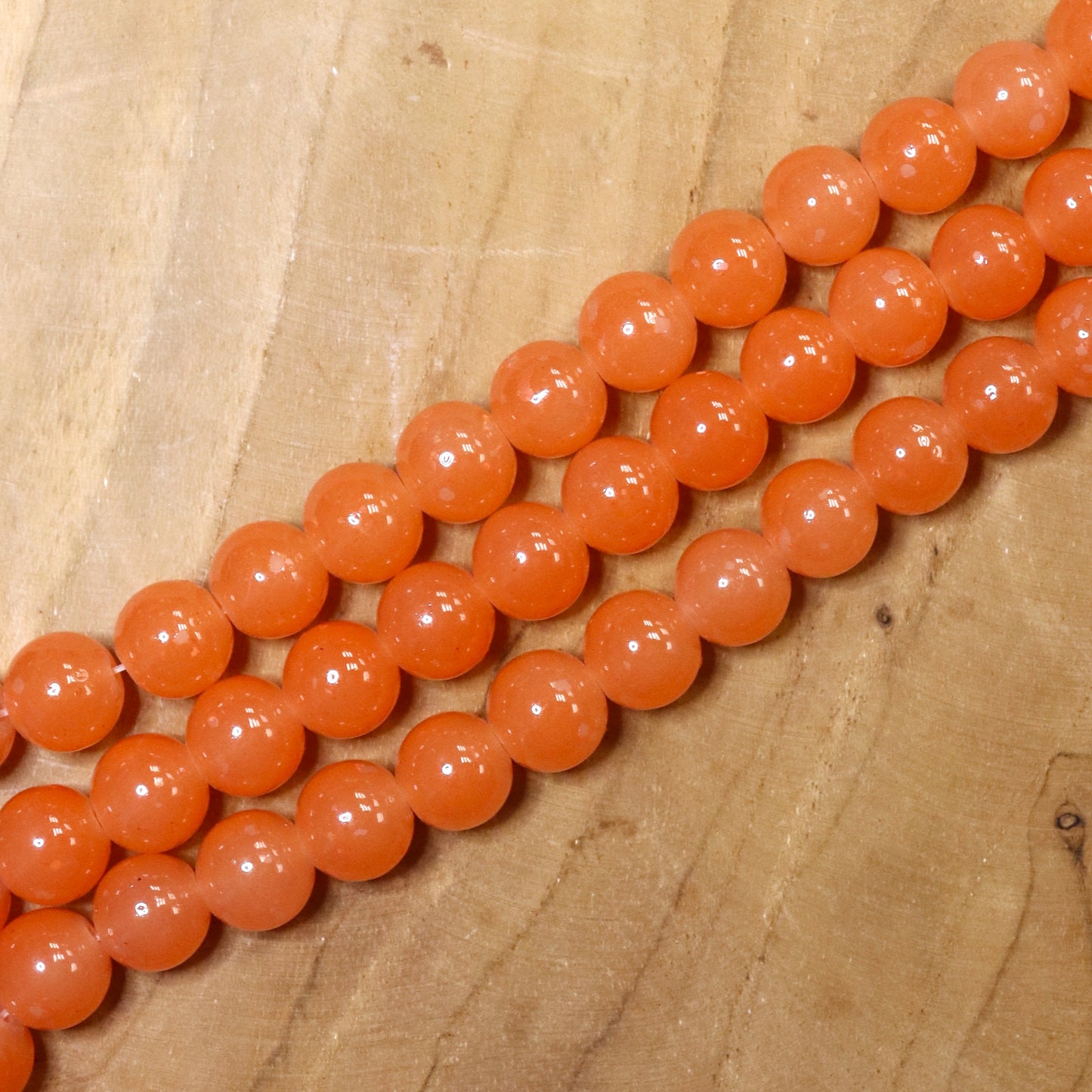 Farbige Glasperlen pro Strang - orange