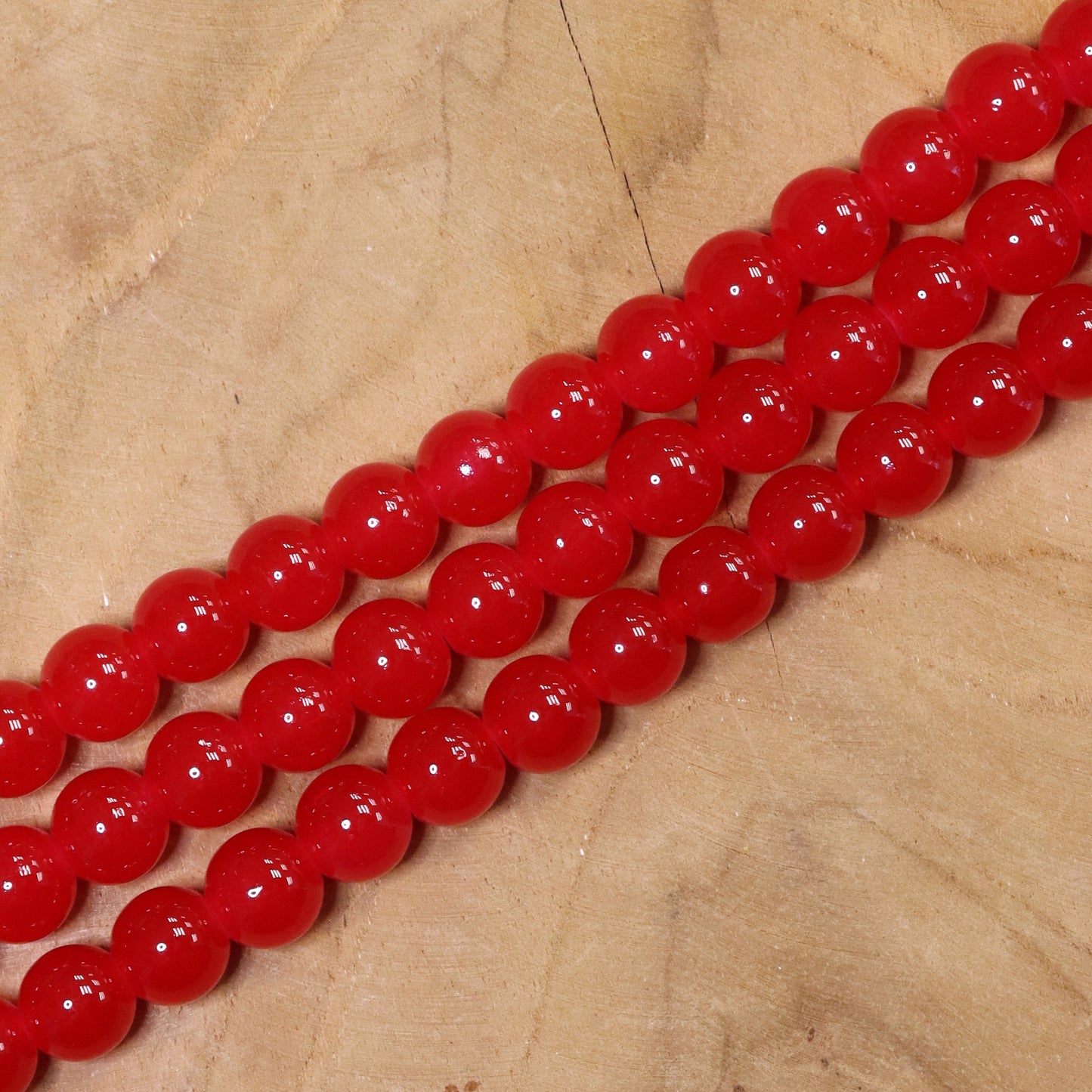 Farbige Glasperlen pro Strang - rot