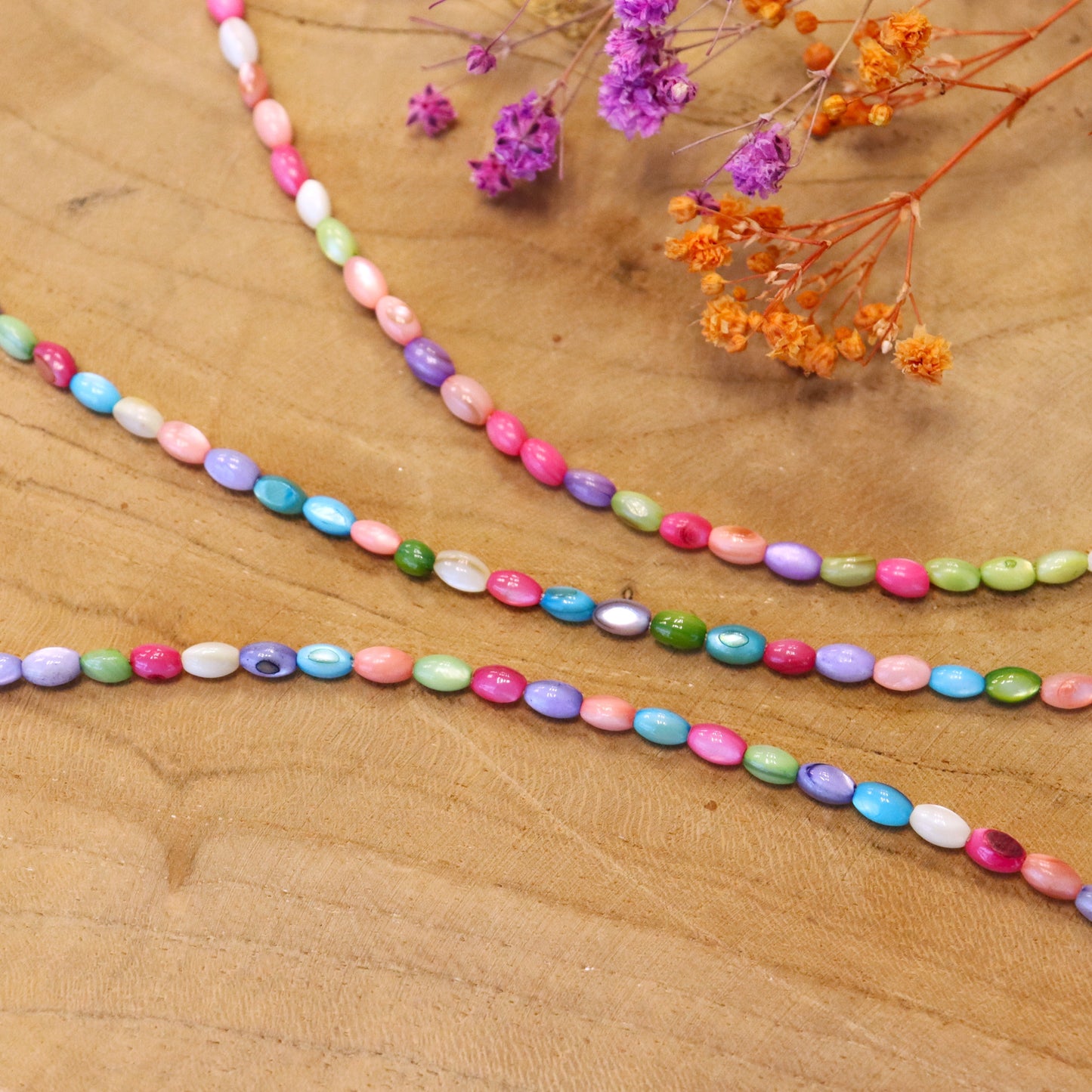 Muschelkette oval mehrfarbig - pro Strang