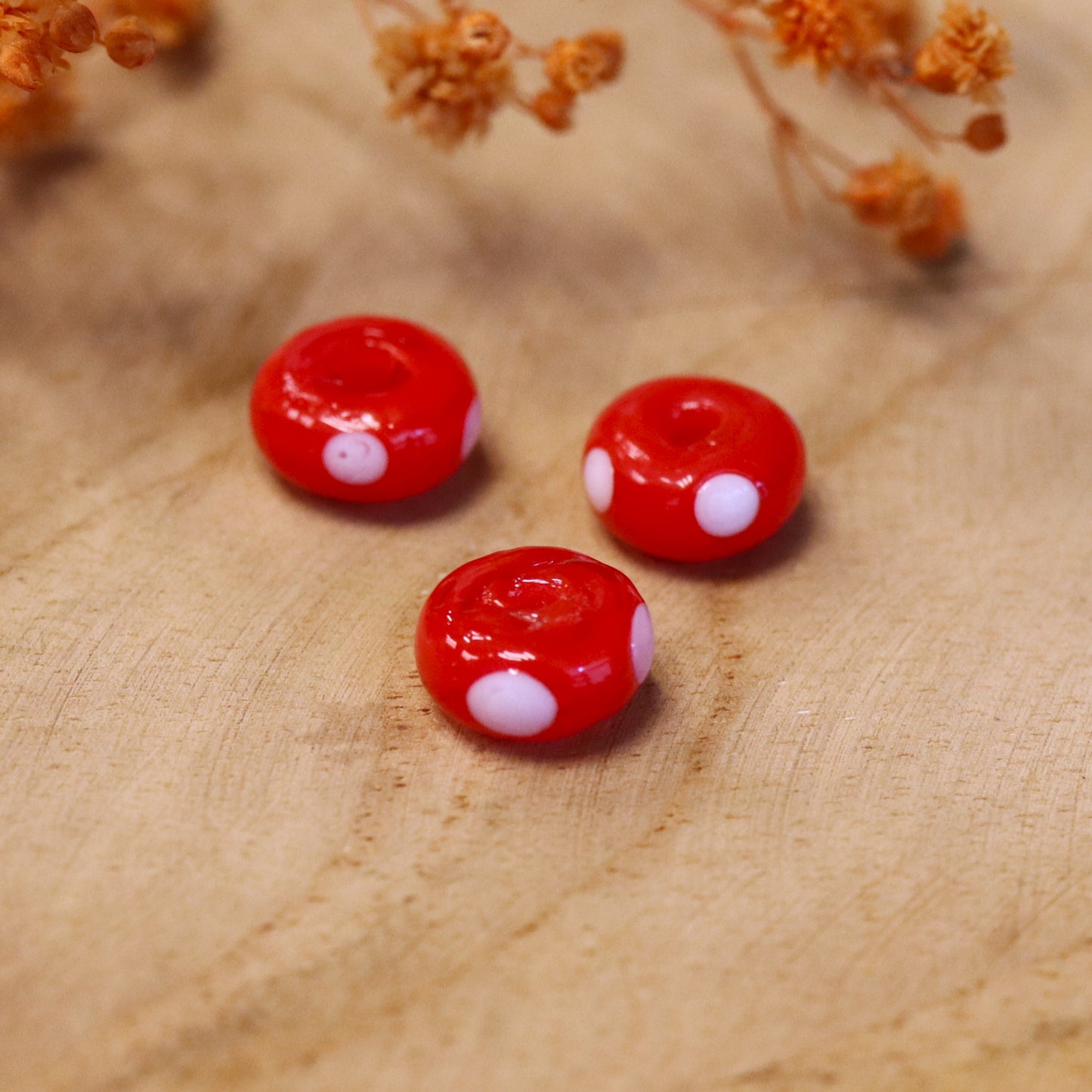 Bead red - oval with white dots
