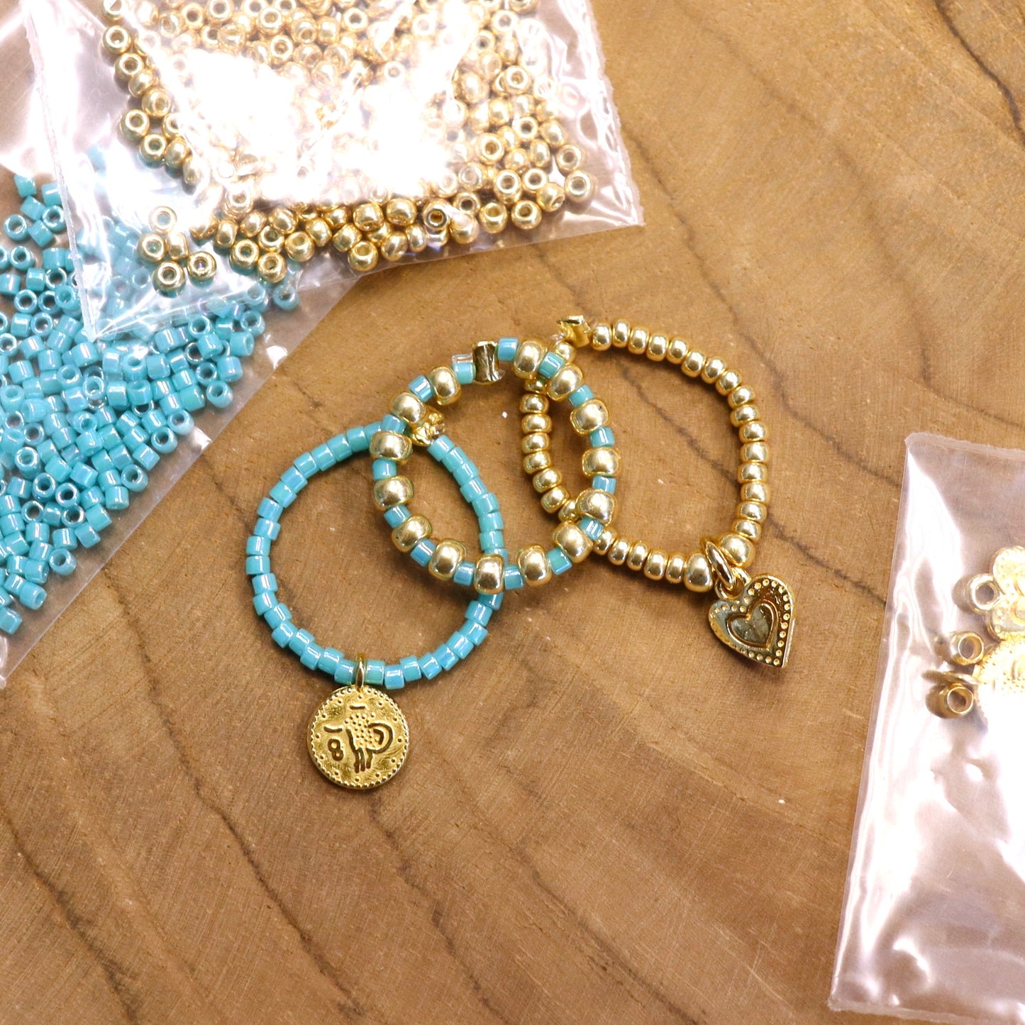 DIY pakket - turquoise/gouden ringenset
