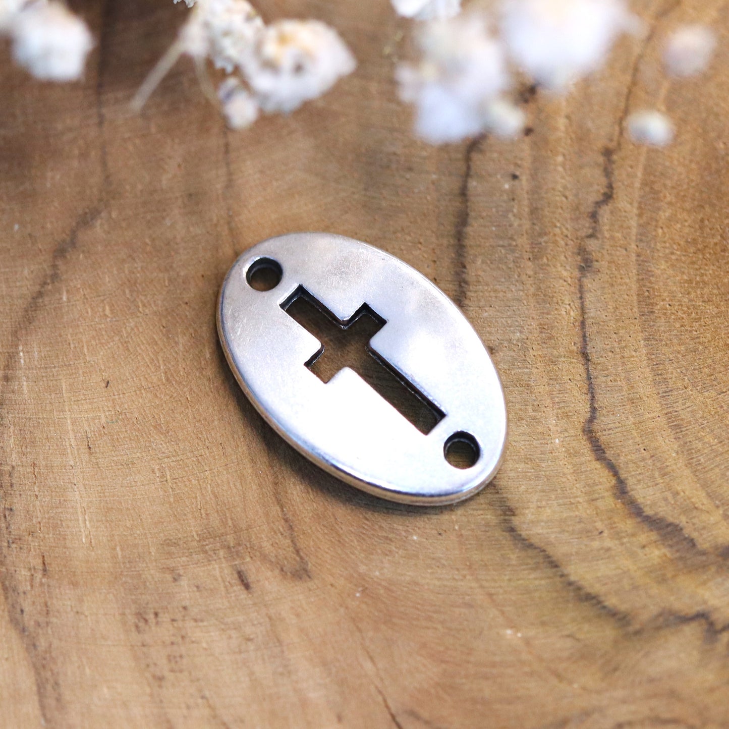 Interposer DQ silver punched out cross