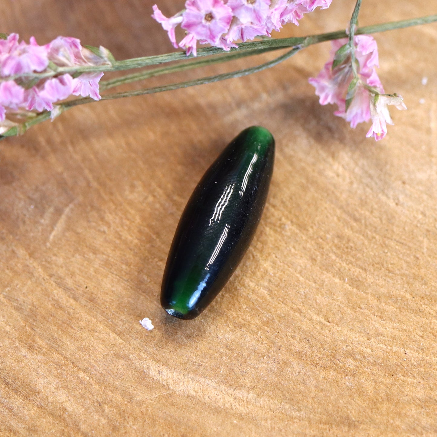 Perle grün - Glasperle lang oval