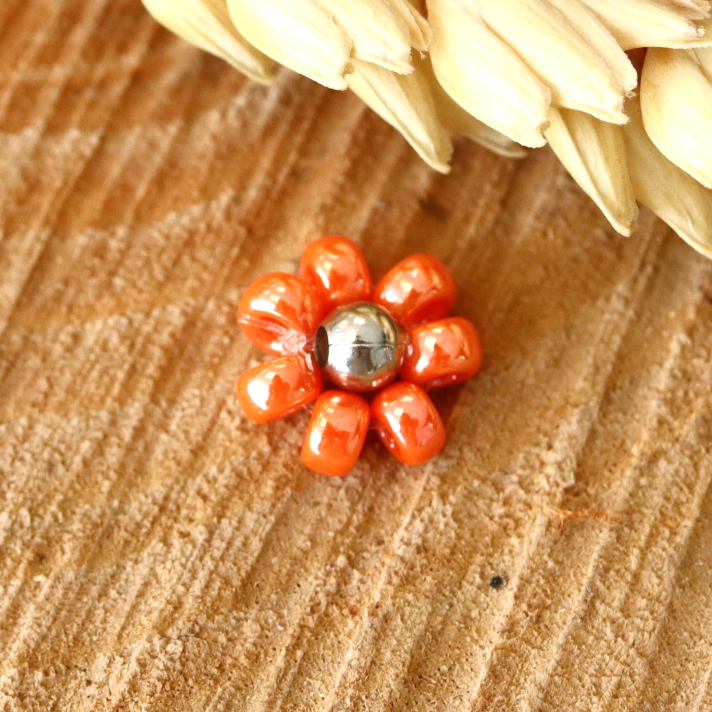 Miyuki Blume orange-silber