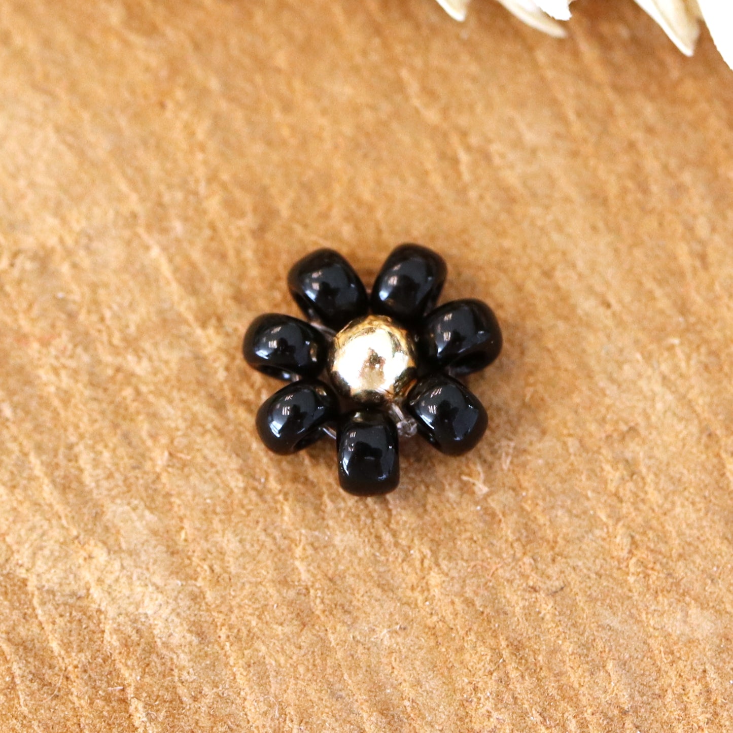 Miyuki Blume schwarz-gold