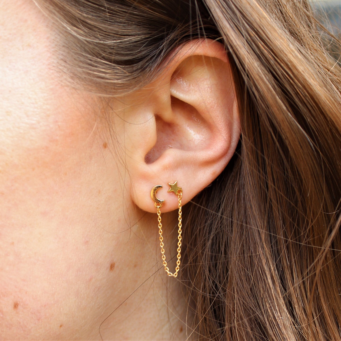 Stainless steel oorsteker maan en ster goud