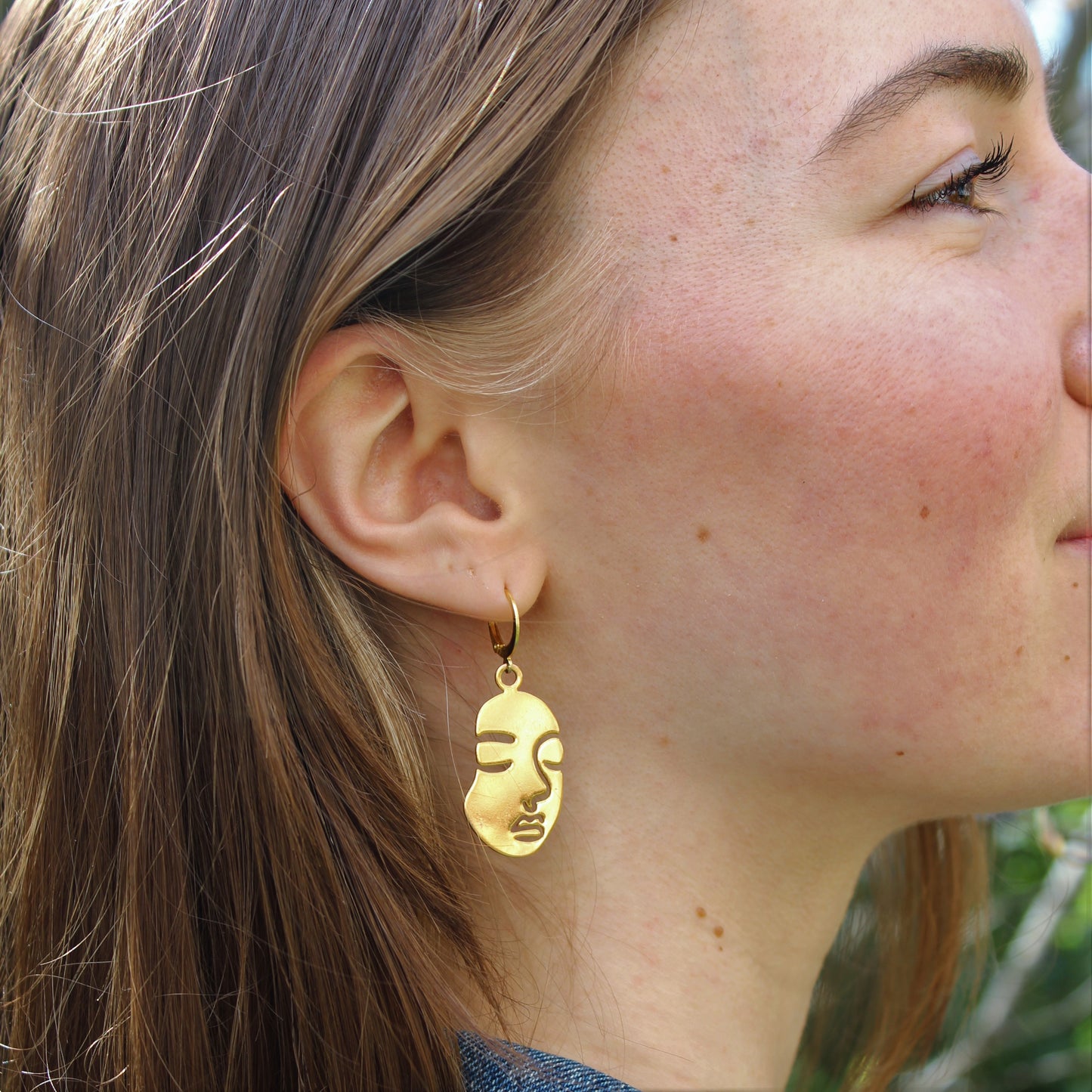 Edelstahl Ohrringe mit Gesicht gold