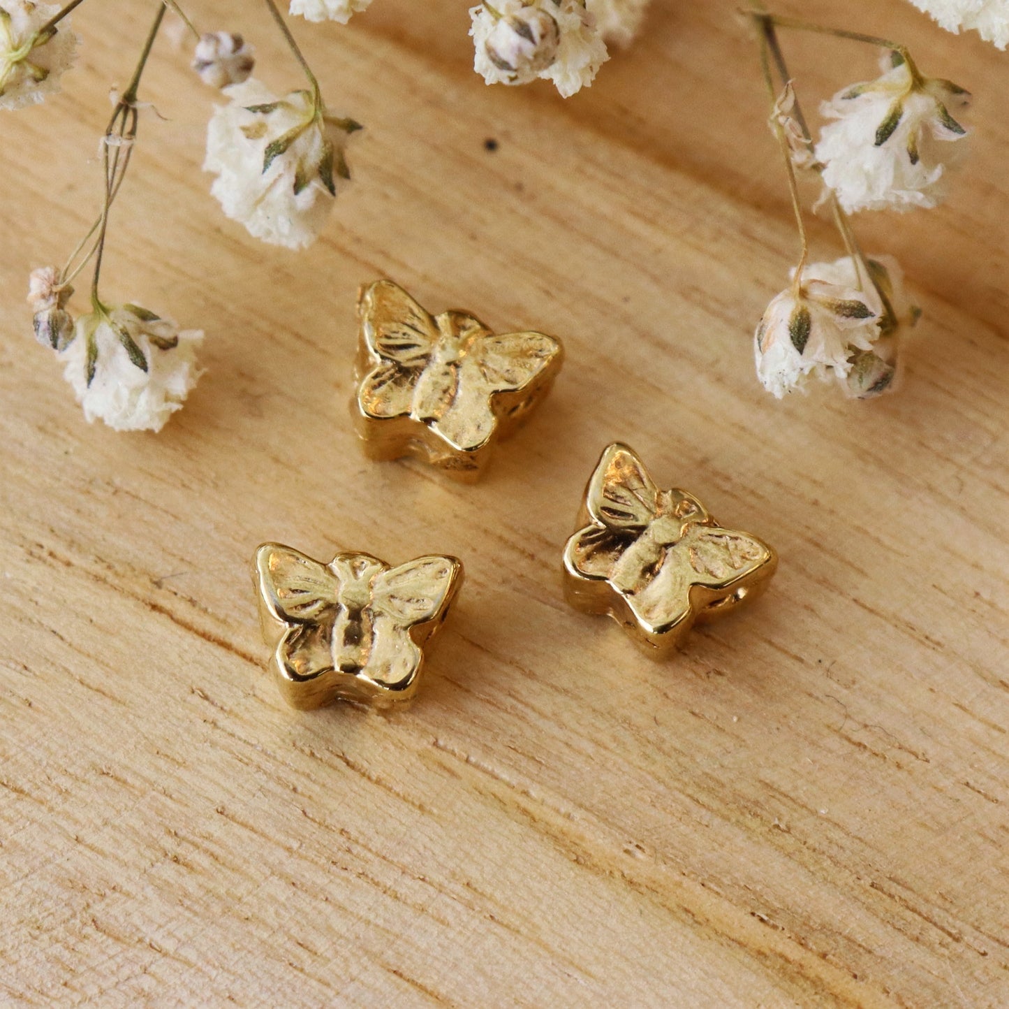 Kraal DQ GOUD vlinder