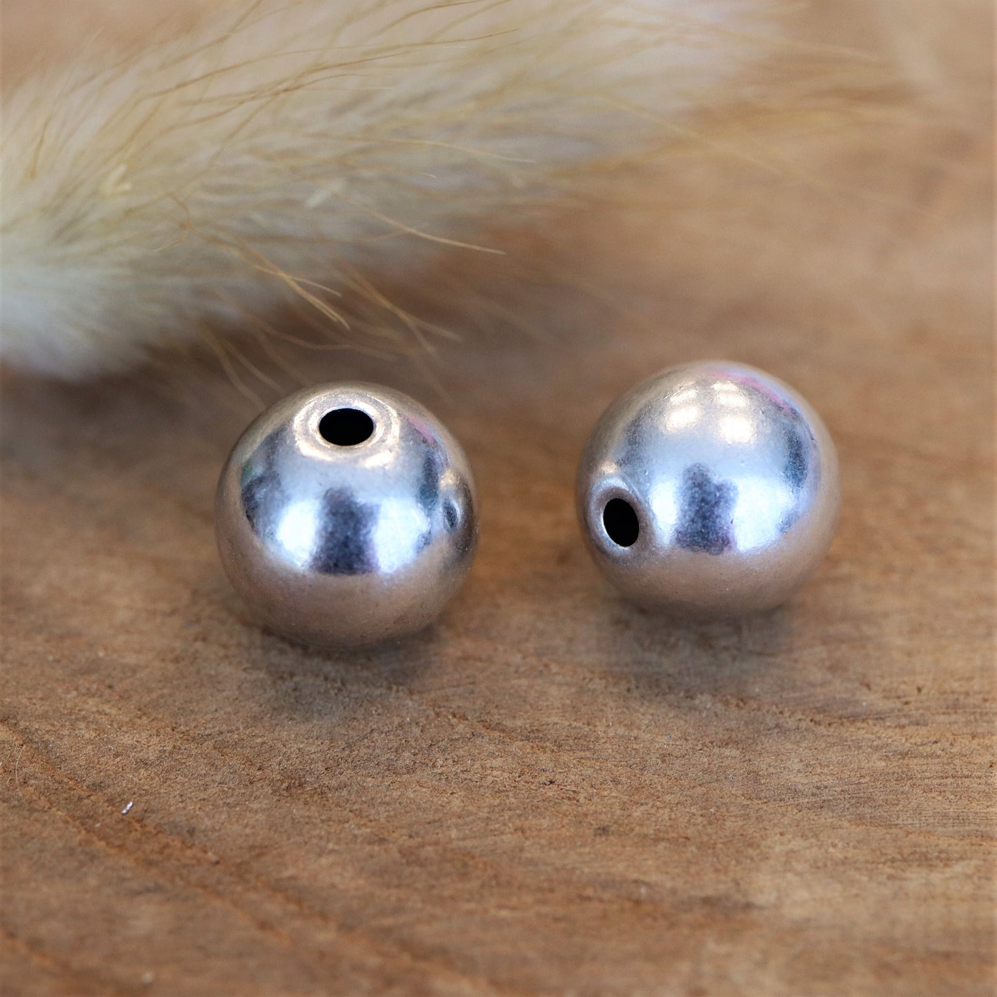 Kraal DQ zilver rond 12 mm