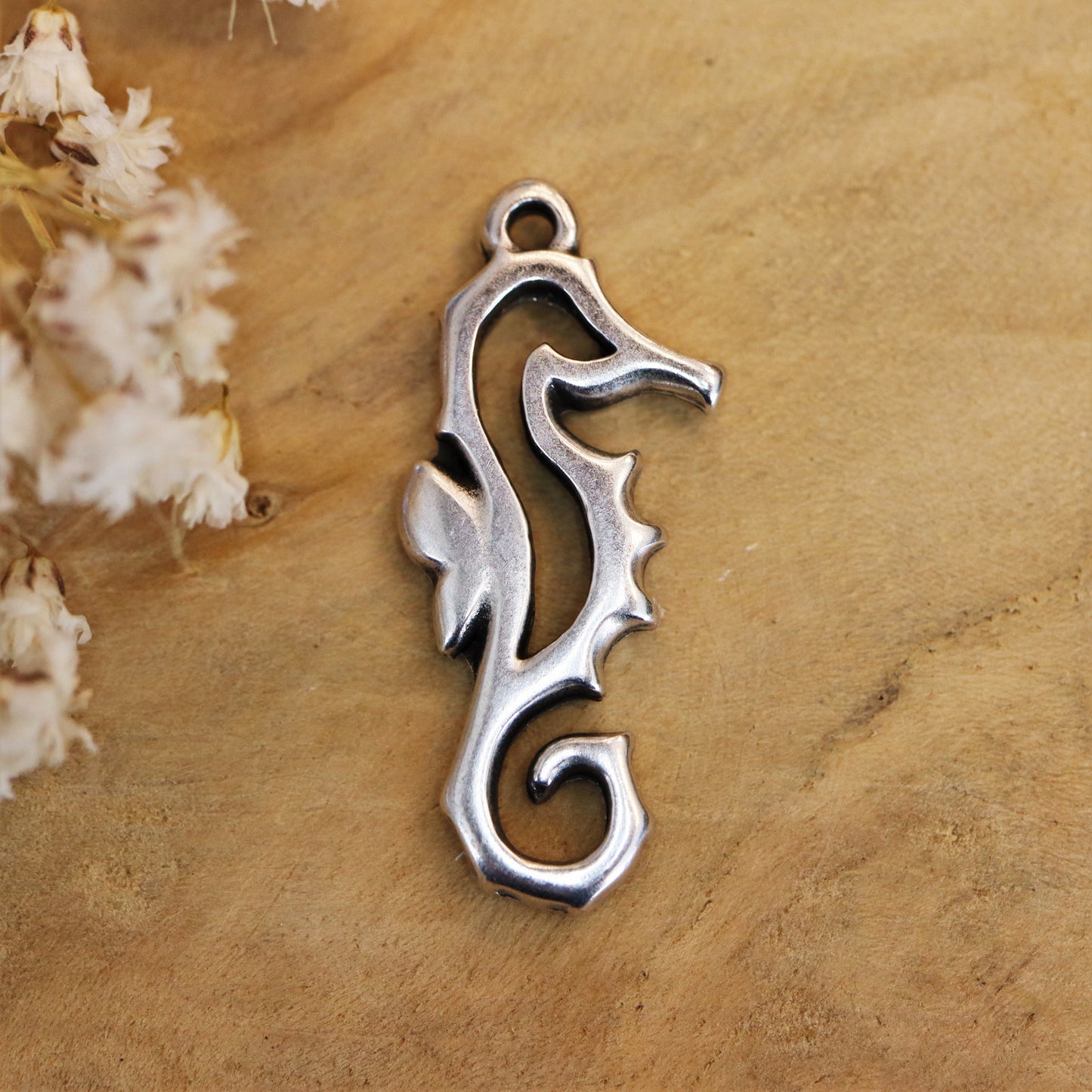 DQ silver seahorse charm