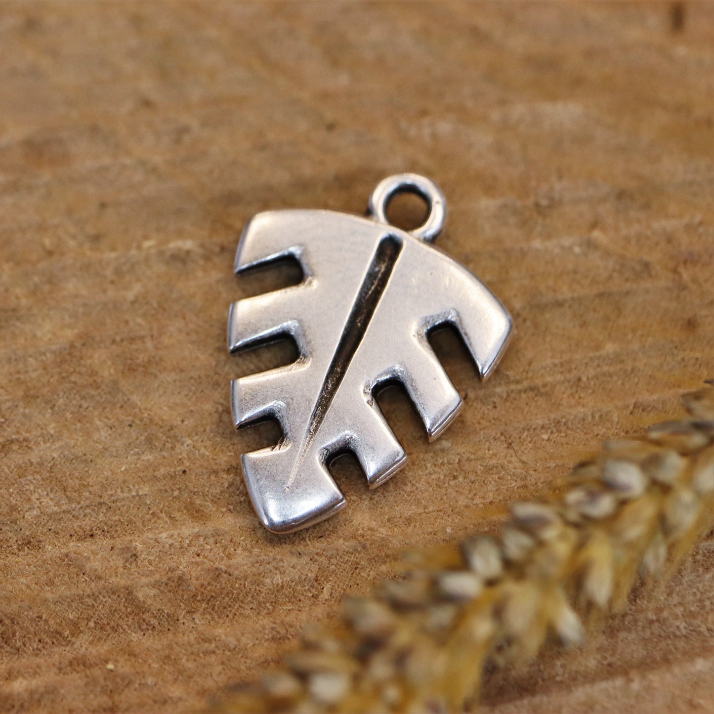 DQ silver triangle leaf charm