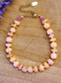 Armband met oranje schelp