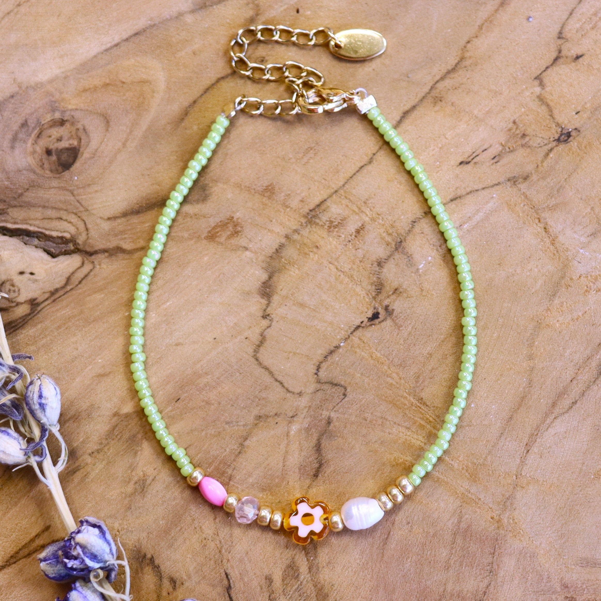 Bracelet green with orange flower