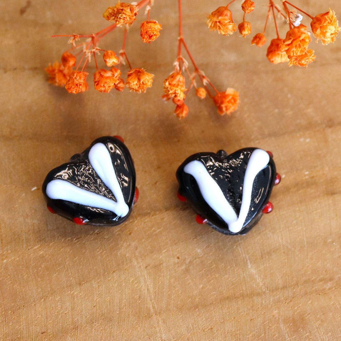 Bead black - ceramic heart with red decoration