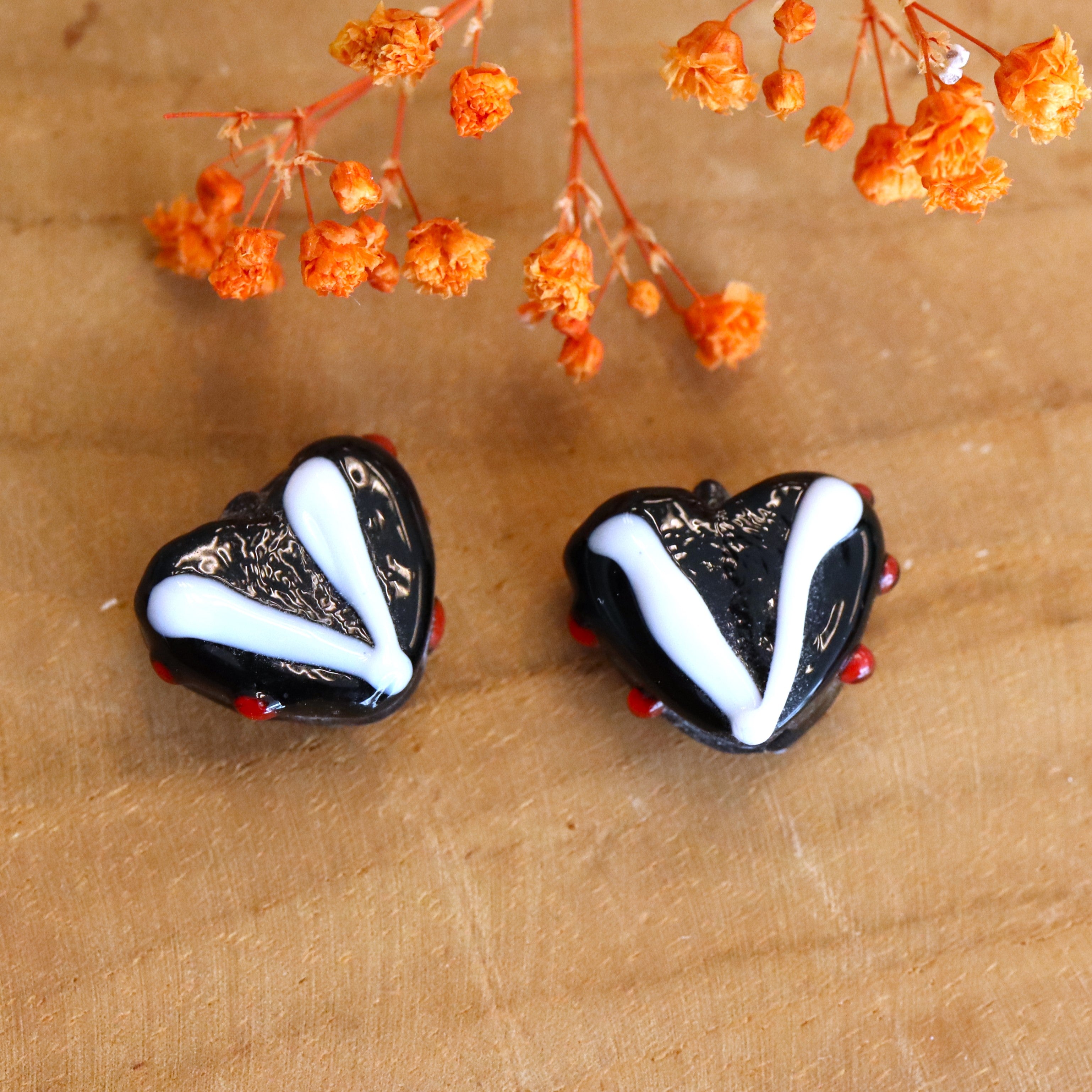 Bead black - ceramic heart with red decoration