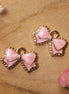Enamel charm - bow pink