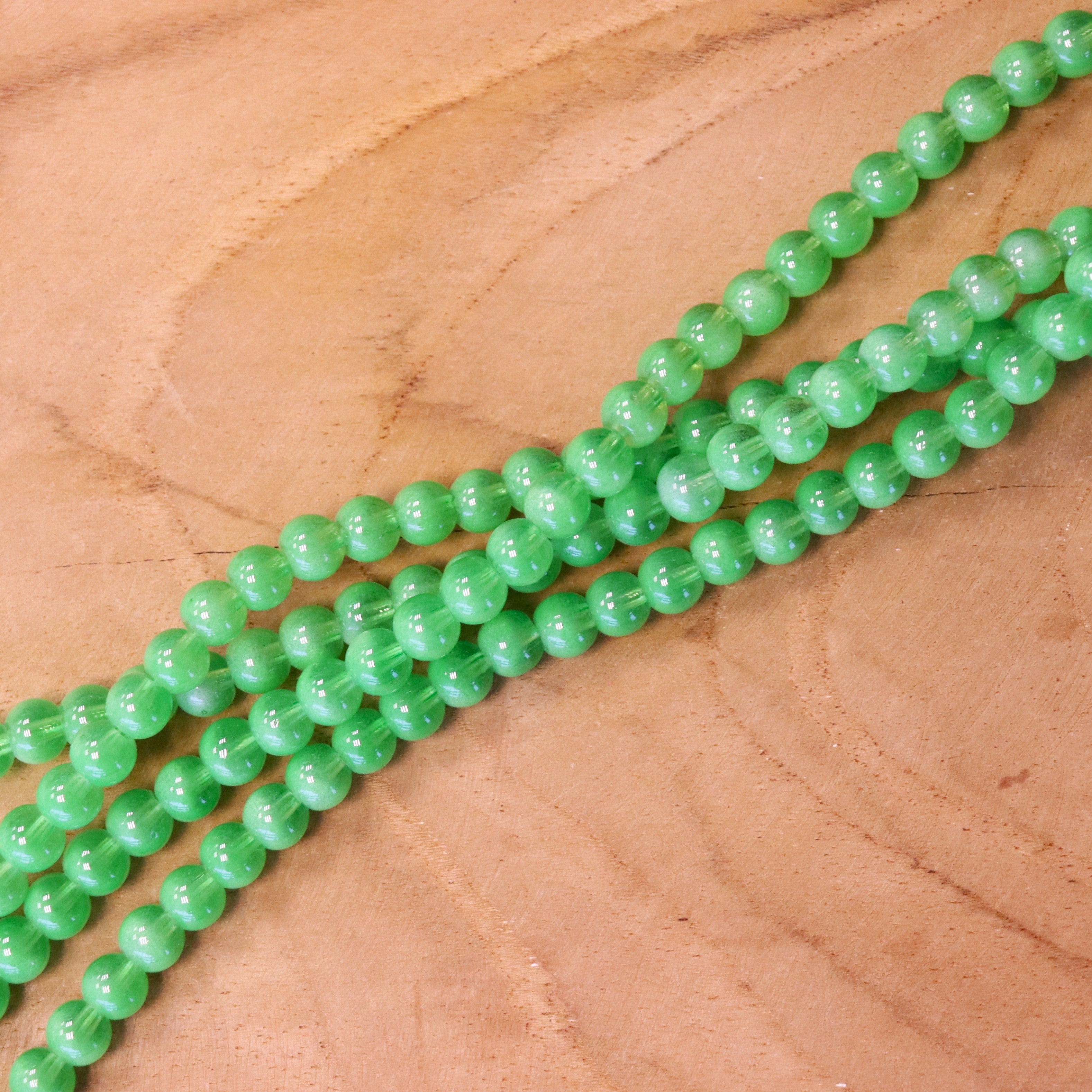 Cat eye glaskralen per streng - groen