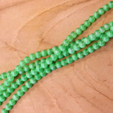 Cat eye glaskralen per streng - groen