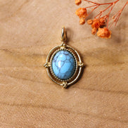 Kettingbedel stainless steel - turkoois met versiering