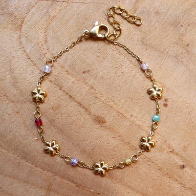 Stainless steel armband bloemetjes en kralen goud