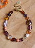Bracelet - purple shades of gold