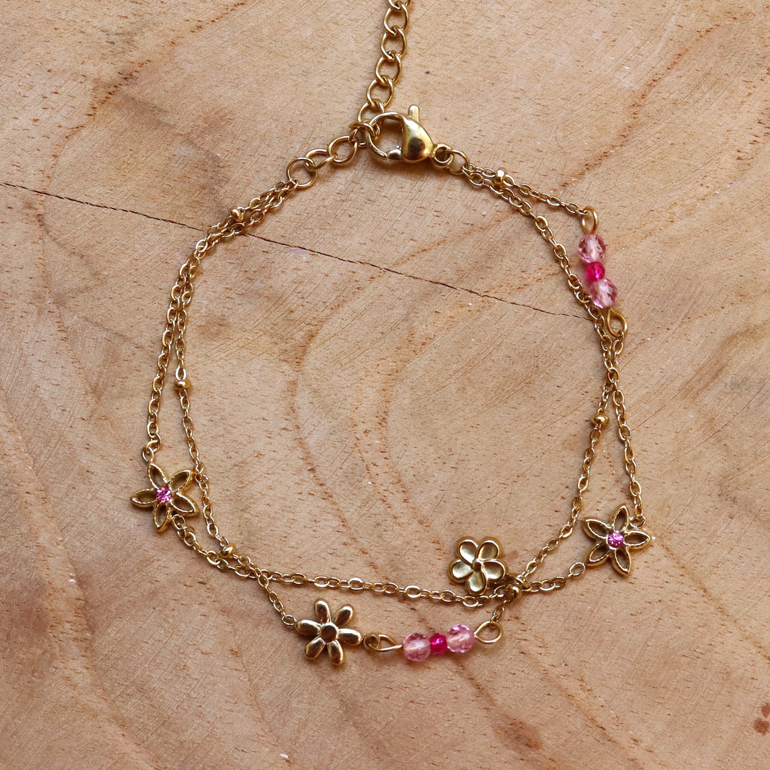 Stainless steel armband dubbel bloemen roze
