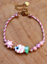 Koord armband roze met vis kraal