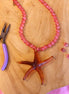 DIY pakket - ketting cateye kralen met zeesterbedel