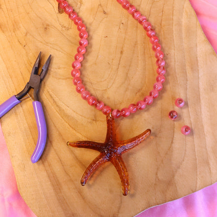 DIY pakket - ketting cateye kralen met zeesterbedel