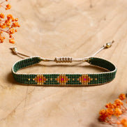 Woven bracelet - green/orange