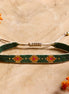 Woven bracelet - green/orange