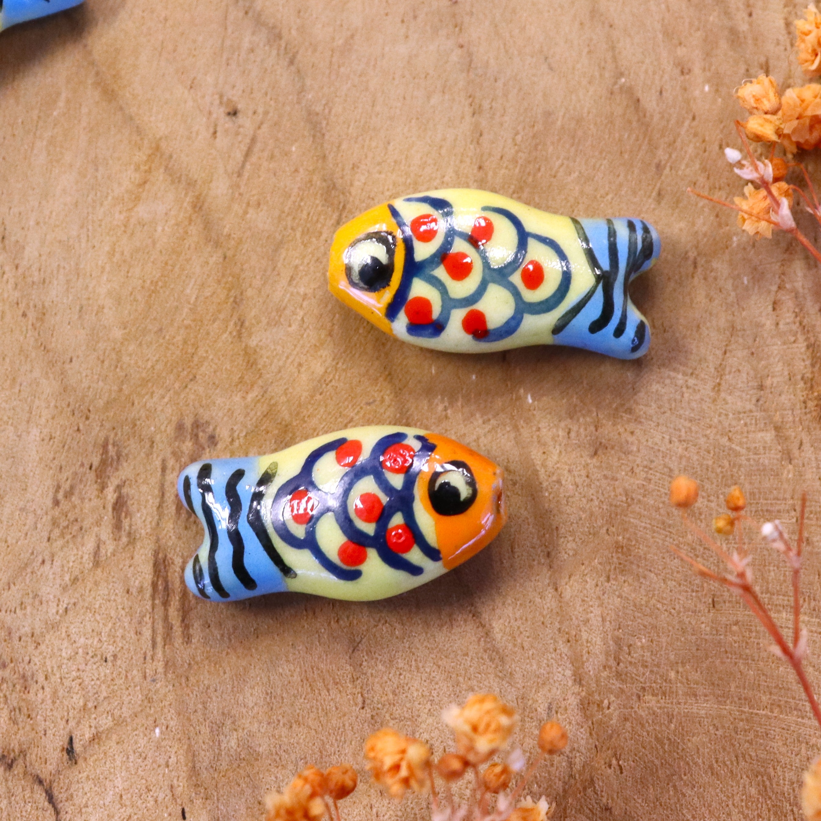 Keramieken vis kraal vintage - oranje geel blauw