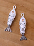 Brass pendant - fish with a stone
