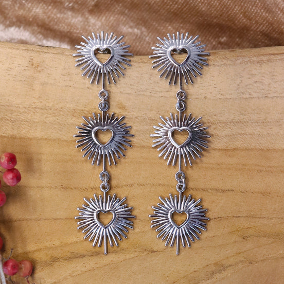 Statement oorbellen harten met sparkle zilver