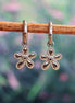 Stainless steel oorbellen met bloemetje zilver