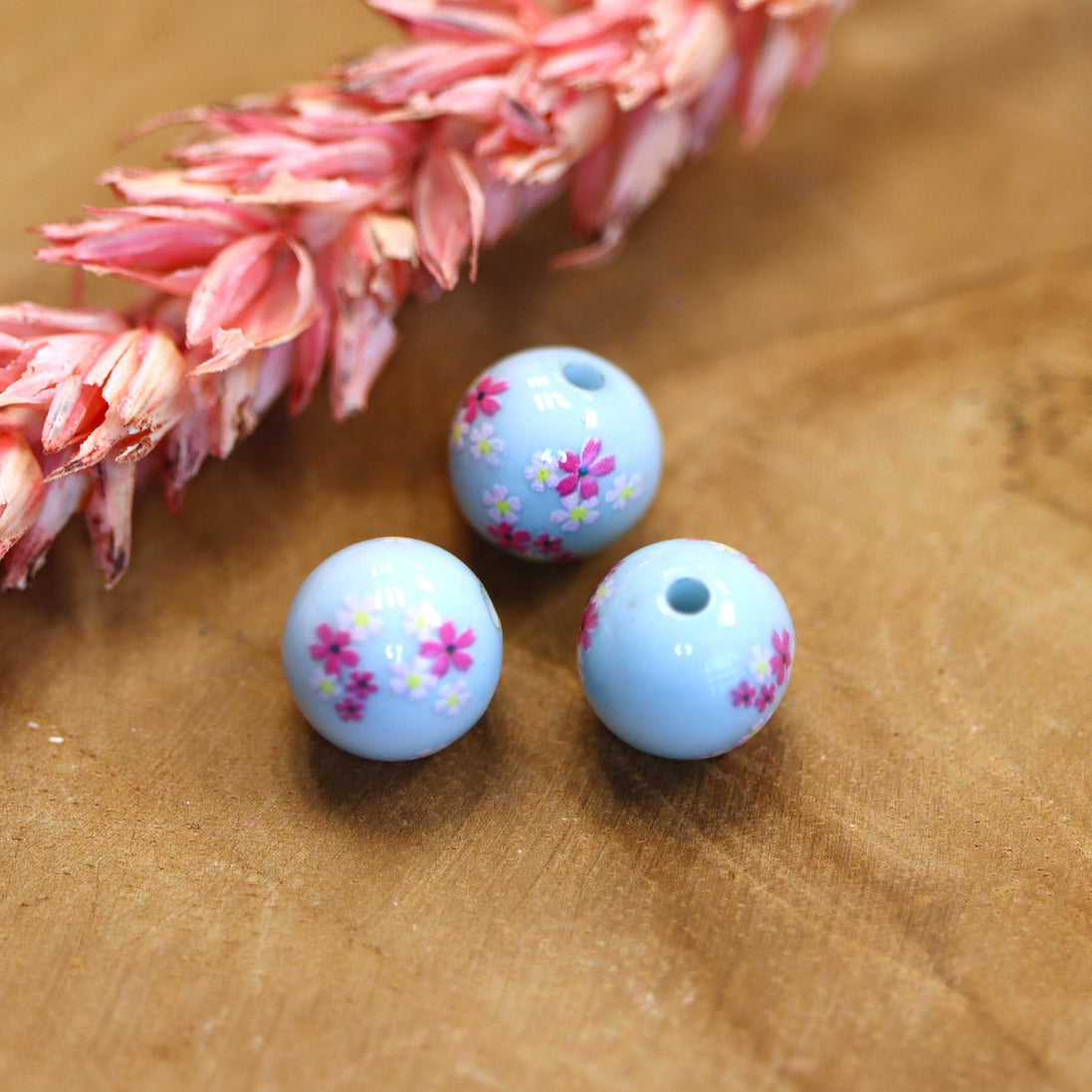 Perle blau - rund mit Blumen