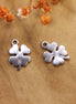 DQ silver four-leaf clover charm