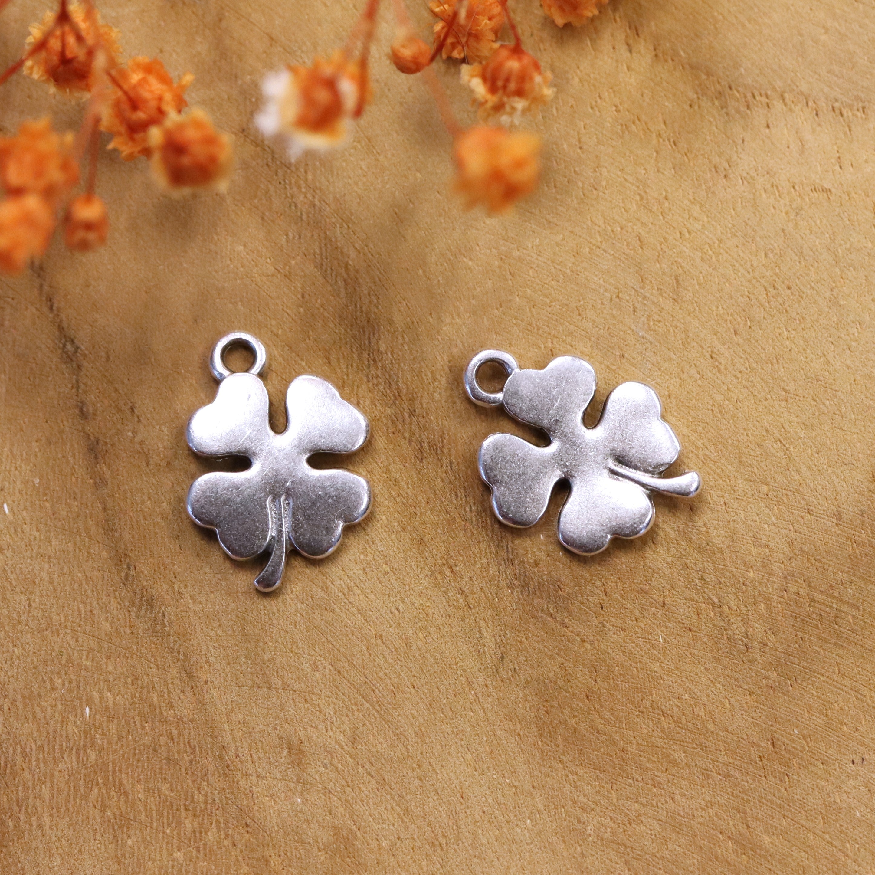 DQ silver four-leaf clover charm