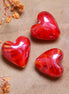 Kraal rood - lampwork hart swirl effect