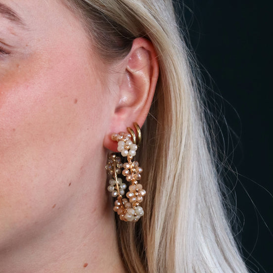 Statement oorbellen goud - oorringen met facetbloemen bruin