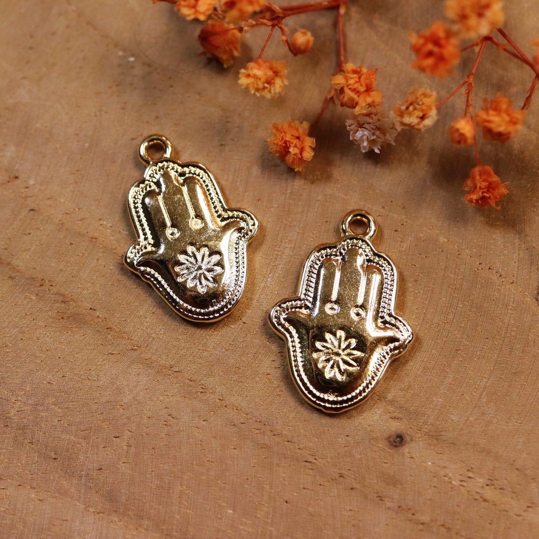 DQ GOLD hamsa hand with flower charm