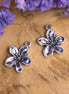 DQ silver flower charm