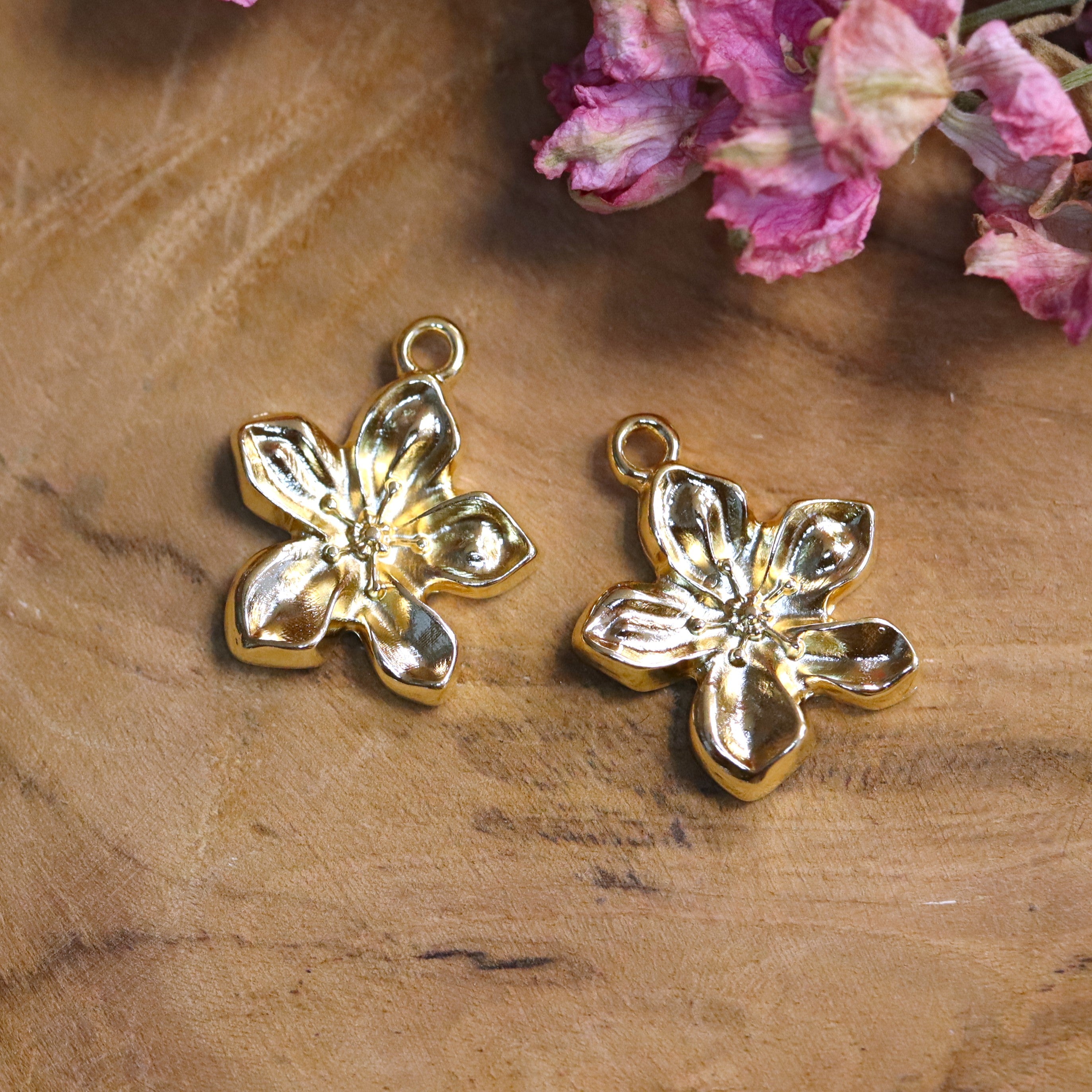 DQ gold flower charm