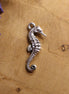 DQ silver seahorse charm