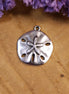 DQ silver sand dollar charm