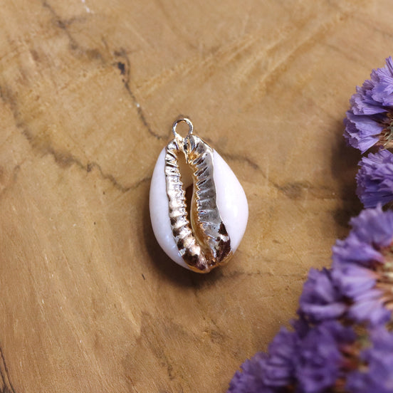Goldplated kauri schelpbedel