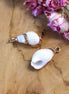 Gold-plated trumpet shell charm