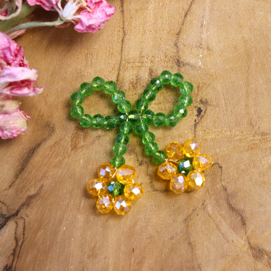 Bedel kralenbloem - strikje oranje